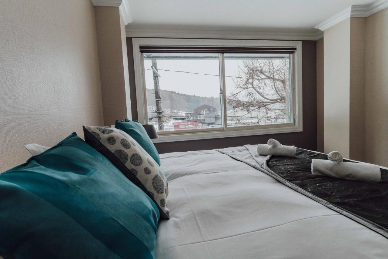 Ski-In, Ski-Out Hatsuyuki Apartments Hakuba Buitenkant foto